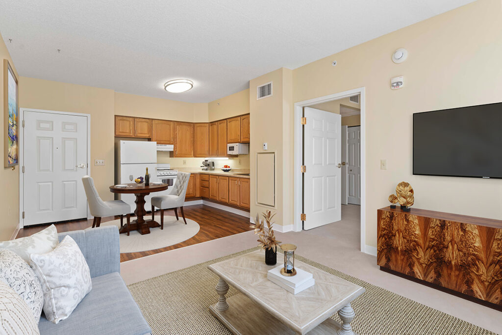 dining room and kitchen view at Kindred Place at Harrisburg senior apartments